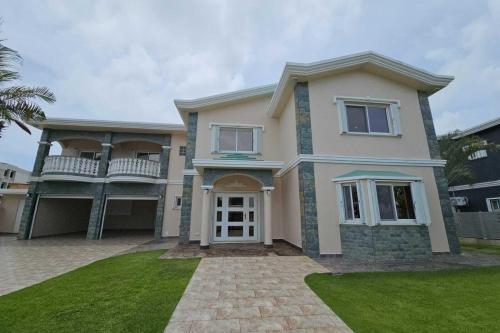 Spacious 4BR Mangilao Home with Balcony & Yard