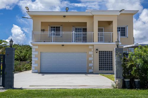 Perfect Family Home – 4BR, Gated Yard, Bonus Kitchen & Outdoor Gazebo
